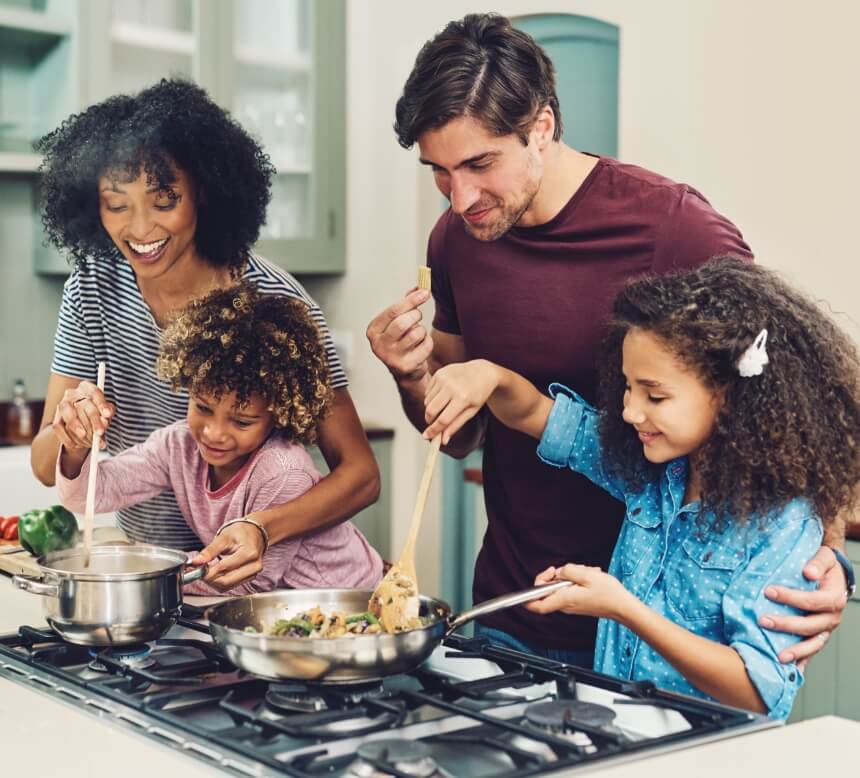 Family cooking a home meal